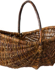 Wicker basket with handle on a white background