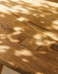 Close-up of a wooden surface with natural grain and texture of wooden dining table