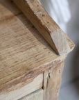 Close up of natural wood rustic cabinet.