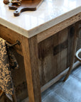 Wooden butchers block with marble top and towel rack