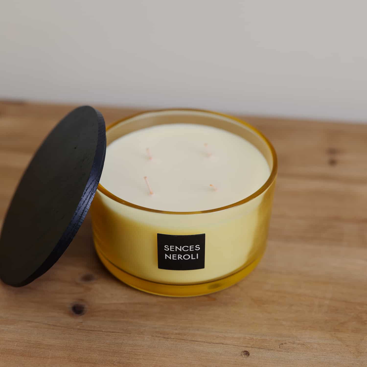 Sences Neroli Lidded Candle view from above with lid leaning off the side.