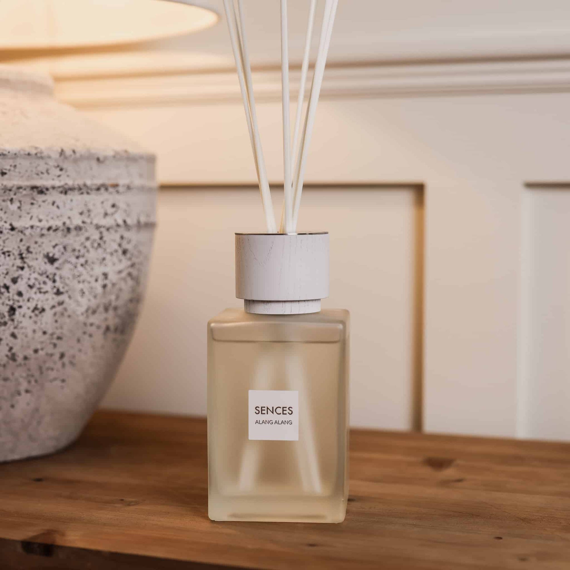 Sences Alang Alang White Reed Diffuser close up on wooden console