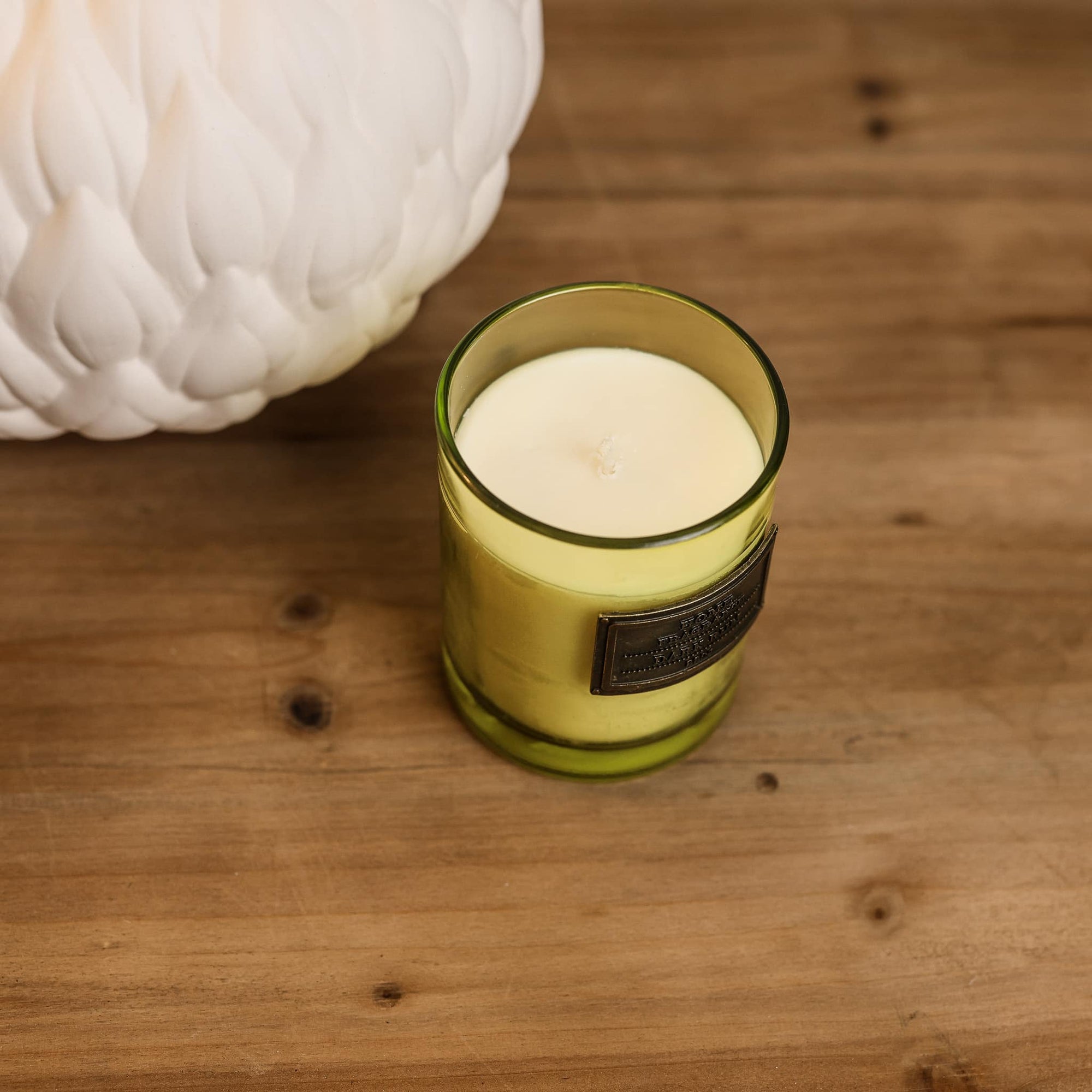 Dark Rum and Lime Scented Candle view from above with wick.