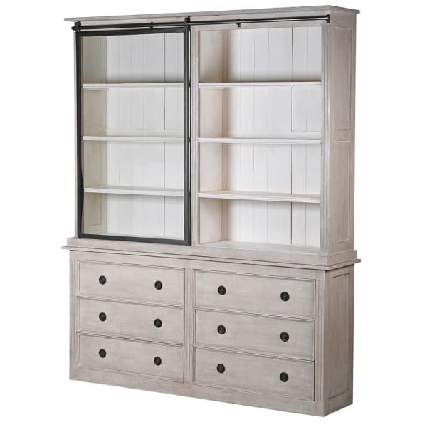 6 drawer white washed storage cabinet with iron hardware and glass sliding door, slid to the left.