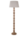 Bamboo look wooden floor lamp with linen shade.