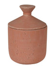 Small terracotta decorative jar with lid on.