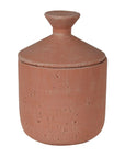 Large terracotta decorative jar with lid on.
