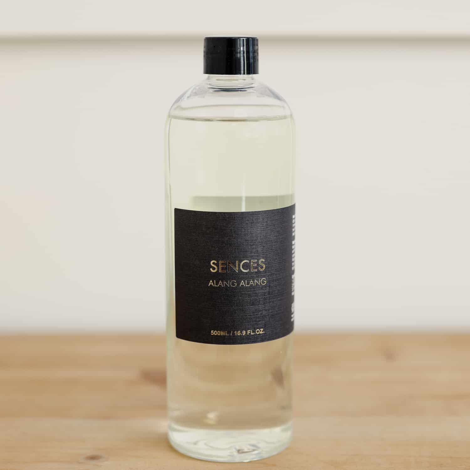 sences alang alang diffuser refill on wooden table