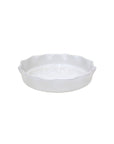 White pie dish with ruffled edge.
