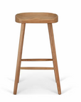 Product image of backless wooden bar stool with curved seat and footrests.