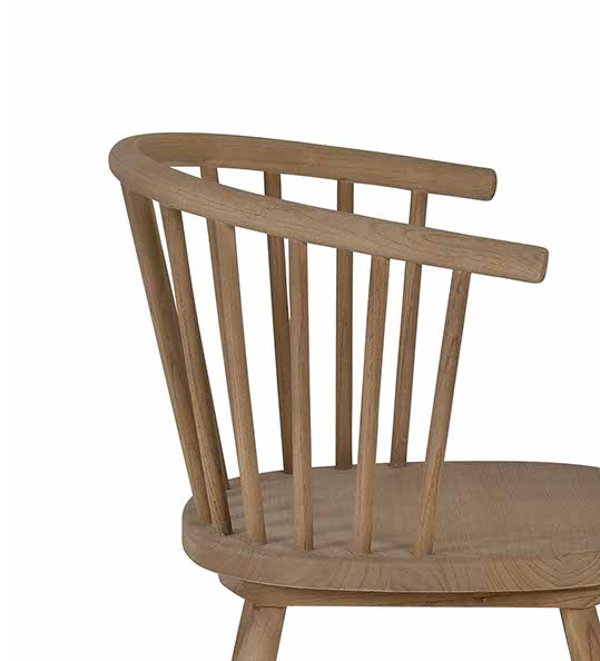 Vintage inspired wooden carver chair with curved back and spindles.