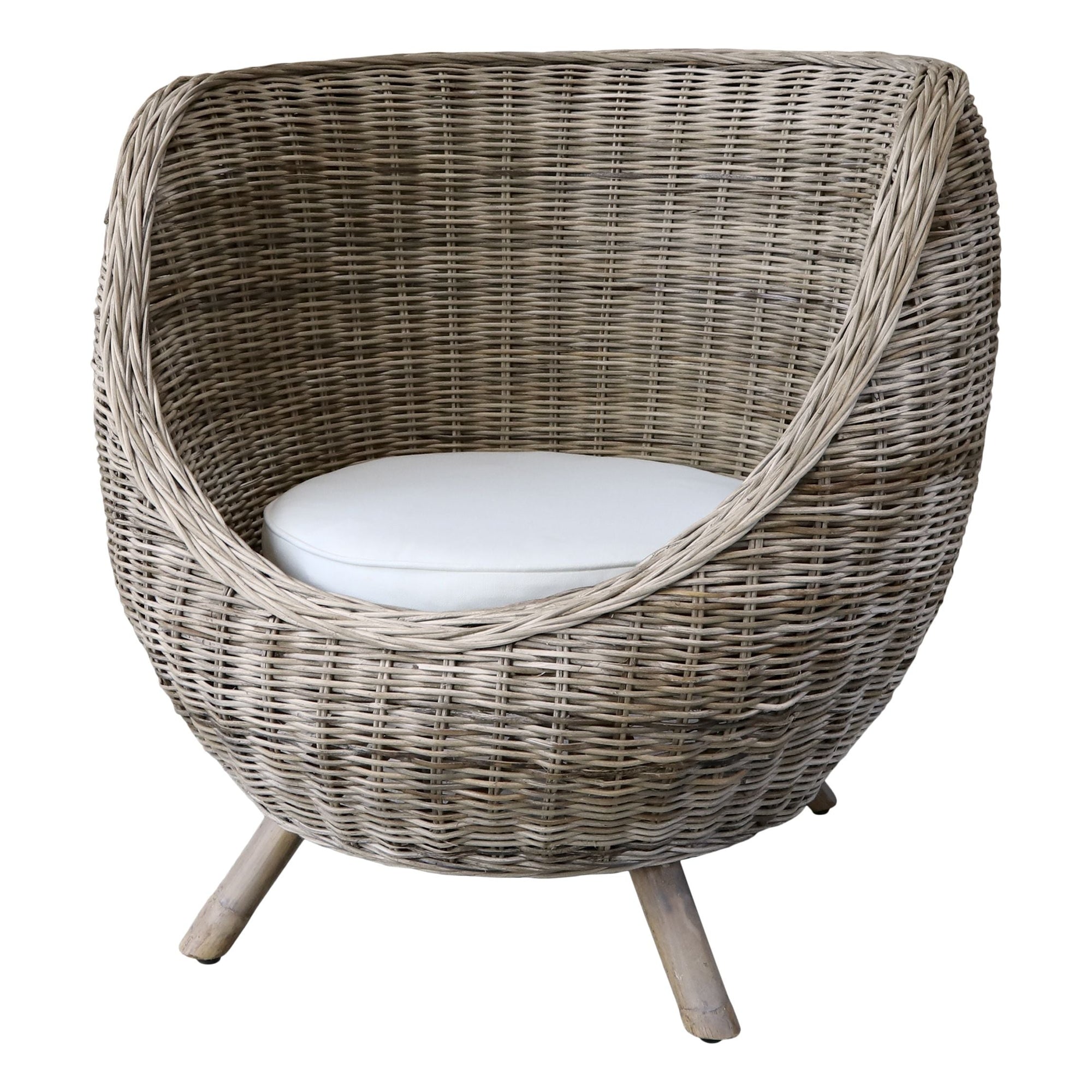 Rattan outdoor armchair with white cushion