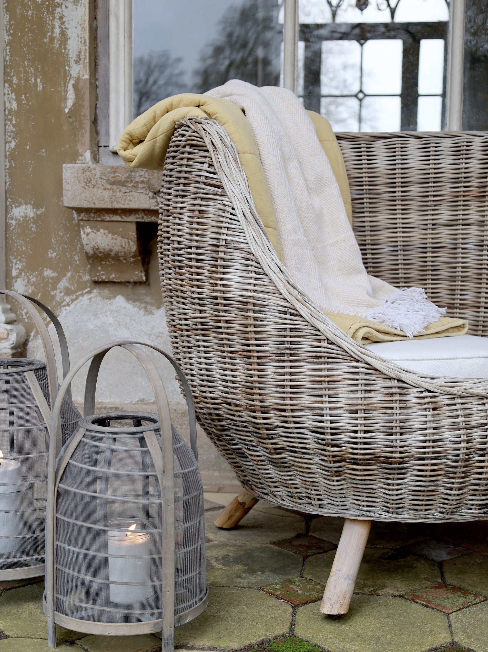 Rattan outdoor armchair.