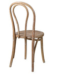 White washed oak dining chair with curved, rounded back from the back.