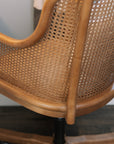 Natural rattan wicker office chair with cane back.