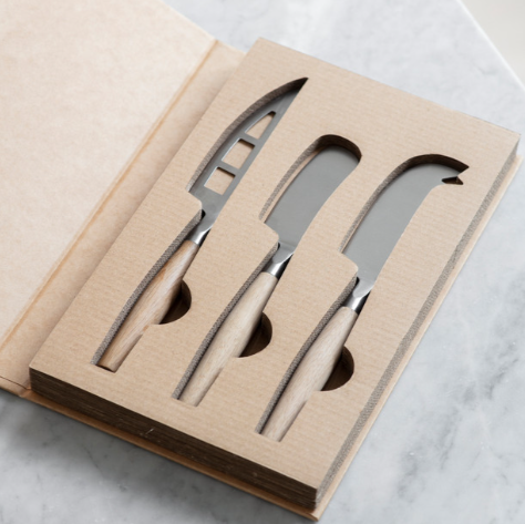 Wood cheese knife set in package.