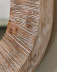 Detailed shot of the frame of a Rustic Round Wooden Mirror.