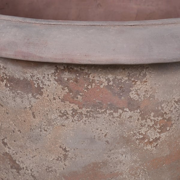 weathered terracotta finish.