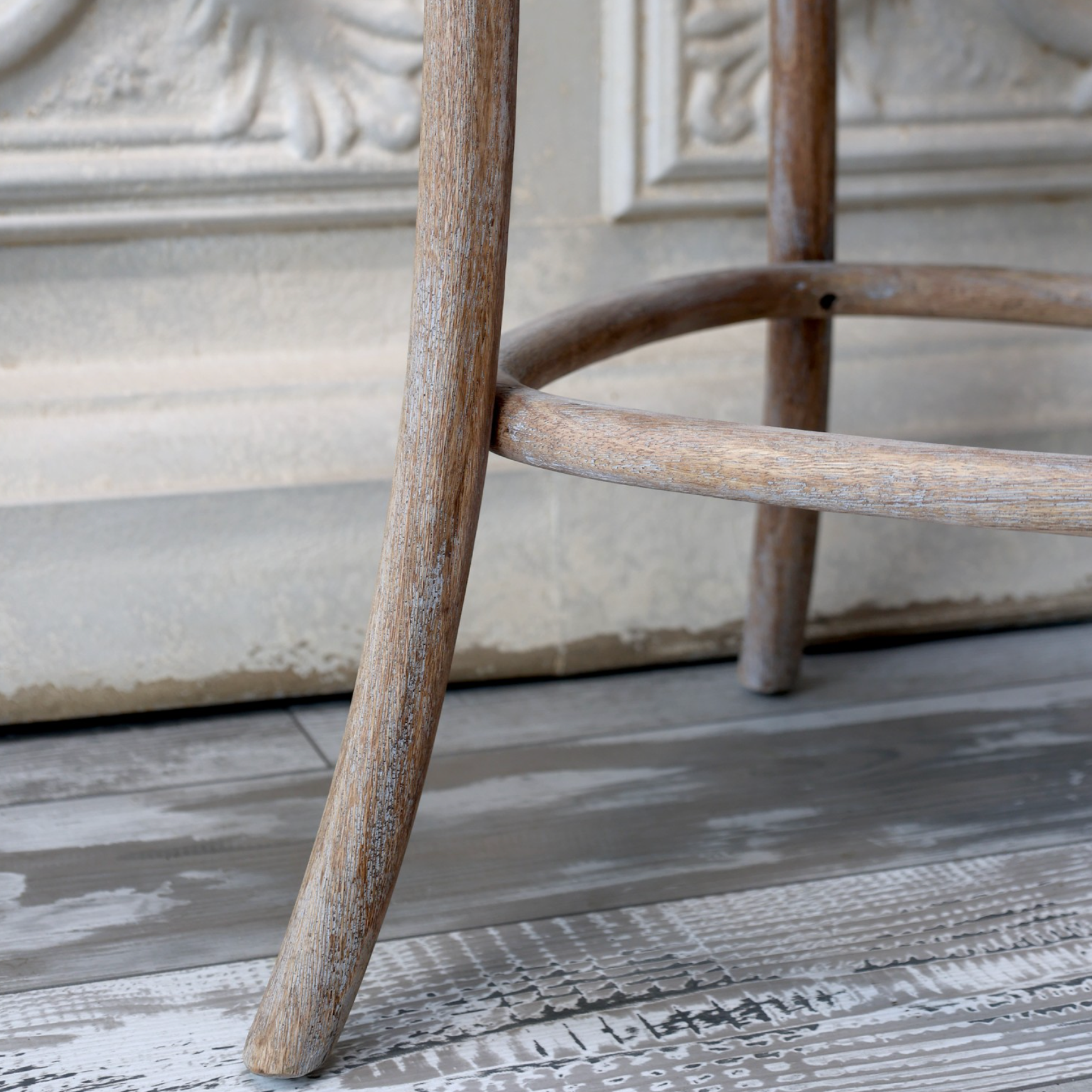 The legs of wicker bar stools.