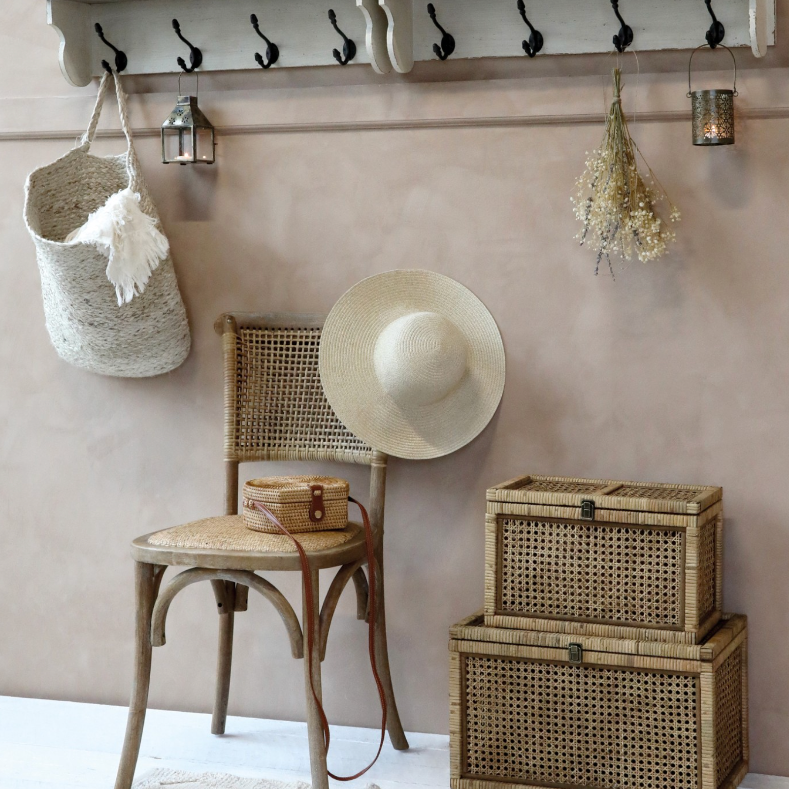 wicker dining chair with sunhat.