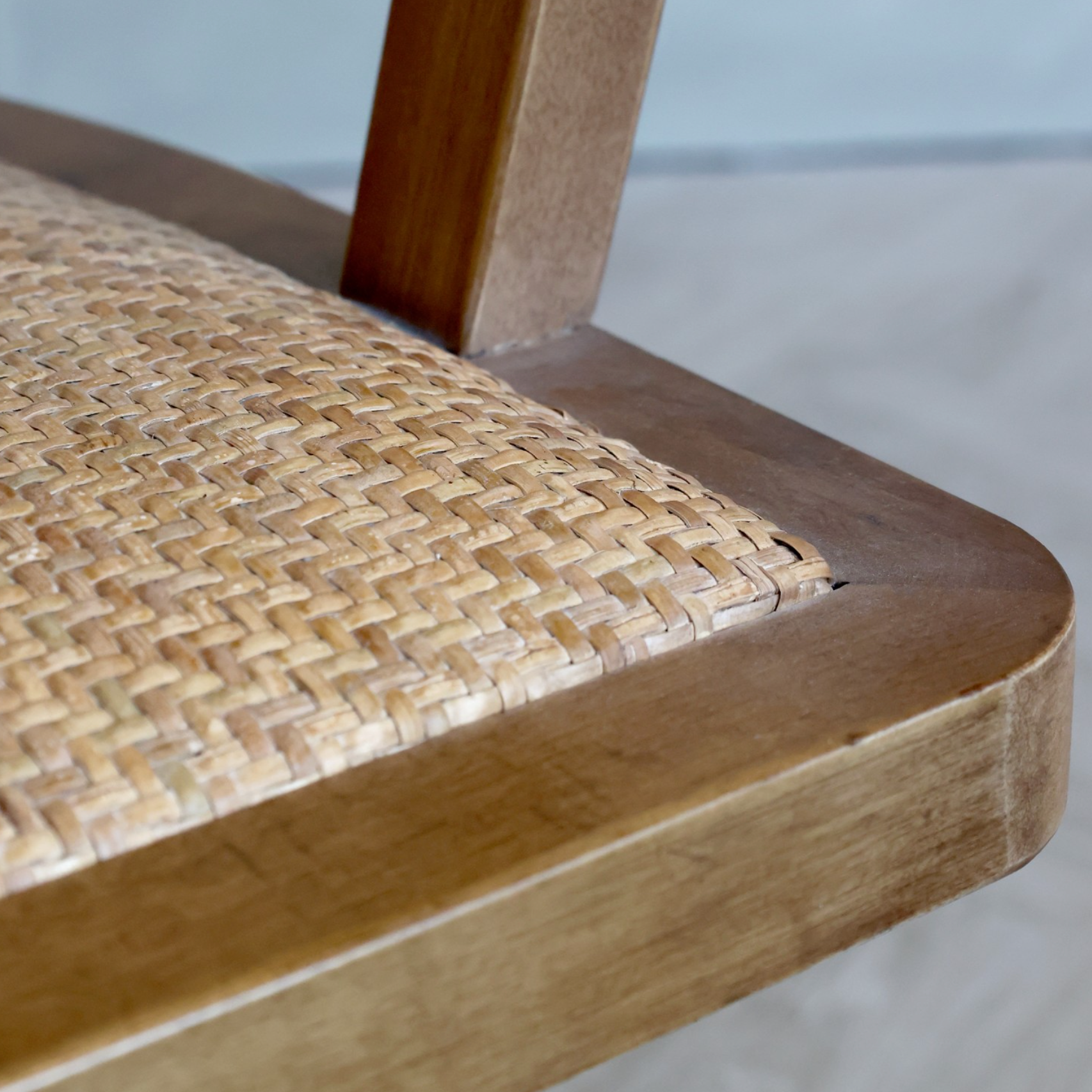Wooden office chair wicker seat.