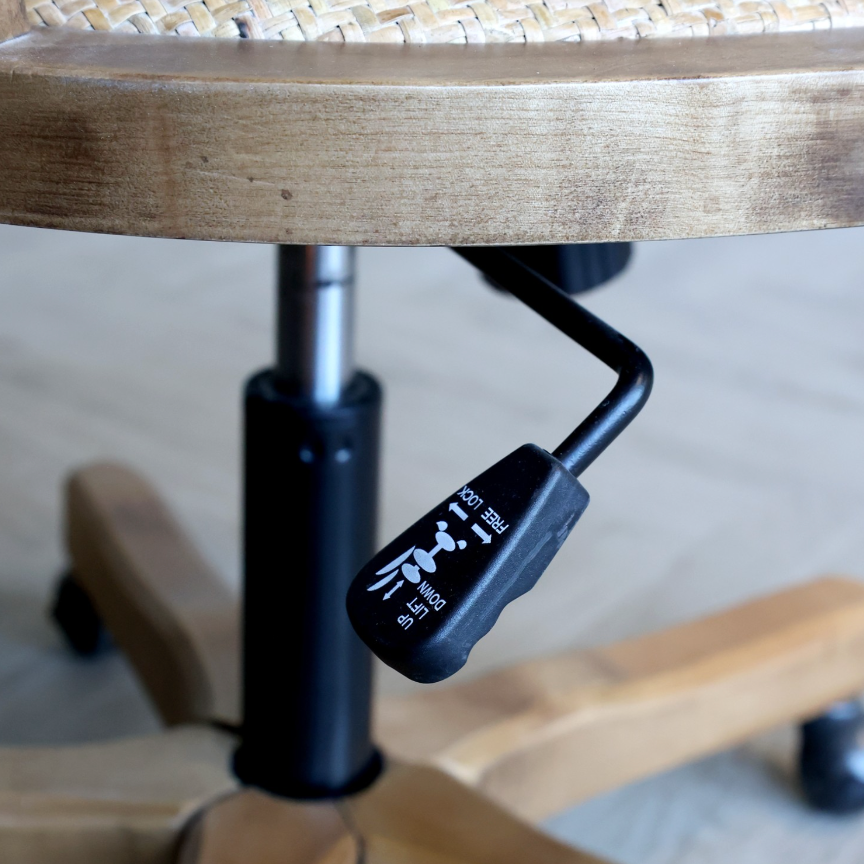 Adjustable wooden office chair.