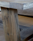 Rustic wooden coffee table leg.