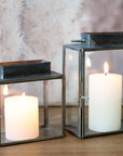 Antique brass lanterns with pilar candles.