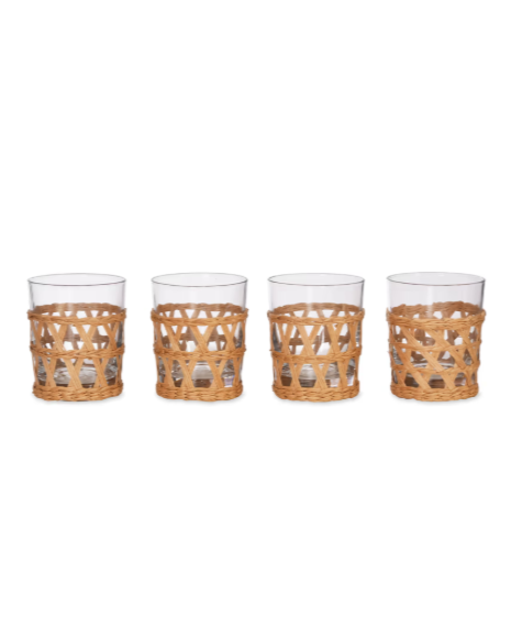 4 glass tumblers with rattan sleeves.