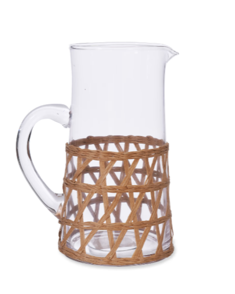 Glass jug with rattan cover.