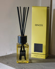 Sences Neroli Mini Reed Diffuser with gift box on stone mantle.