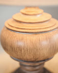 Close up of wooden lamp base.