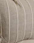 Close up of texture on natural coloured striped cushion.