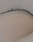 Detailed shot of linen dining chair.