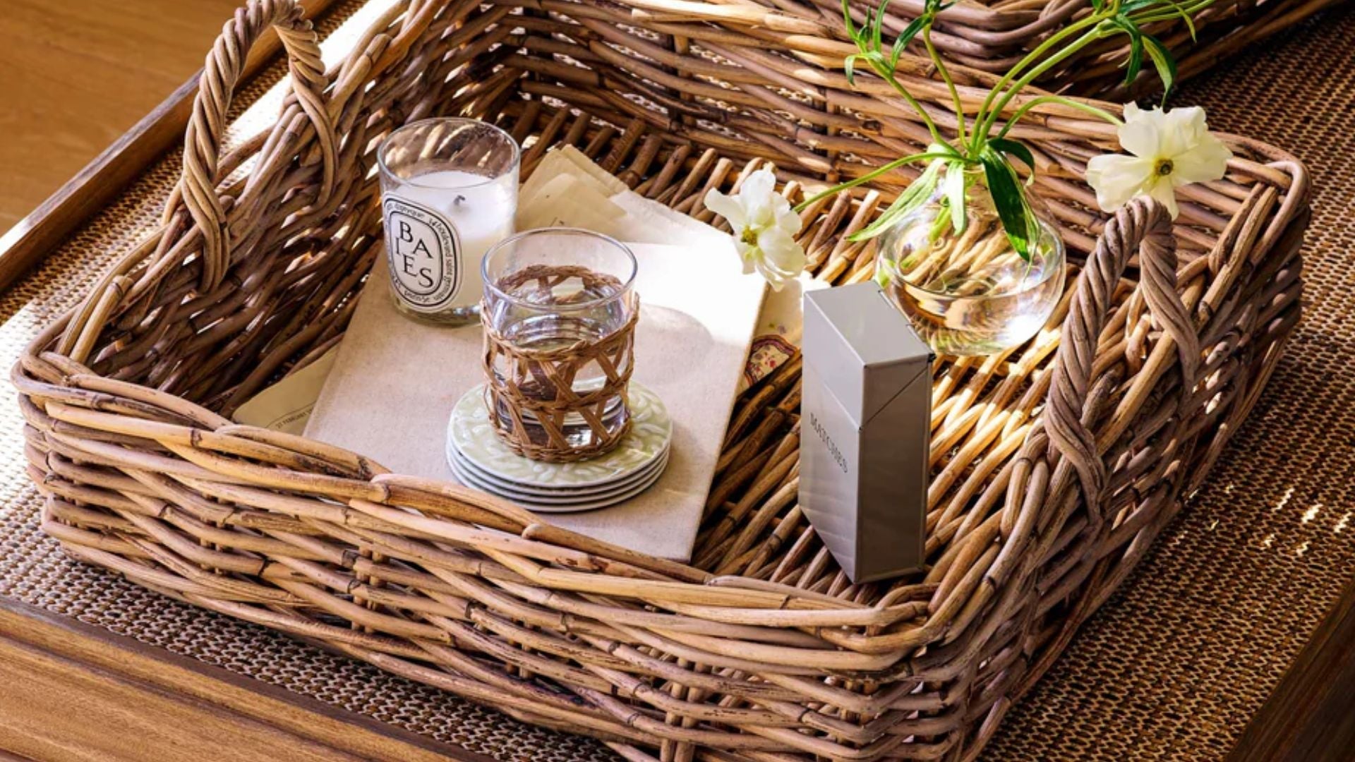 Wicker basket storage trays on table