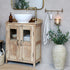 Natural wood rustic cabinet with sink on top in bathroom.