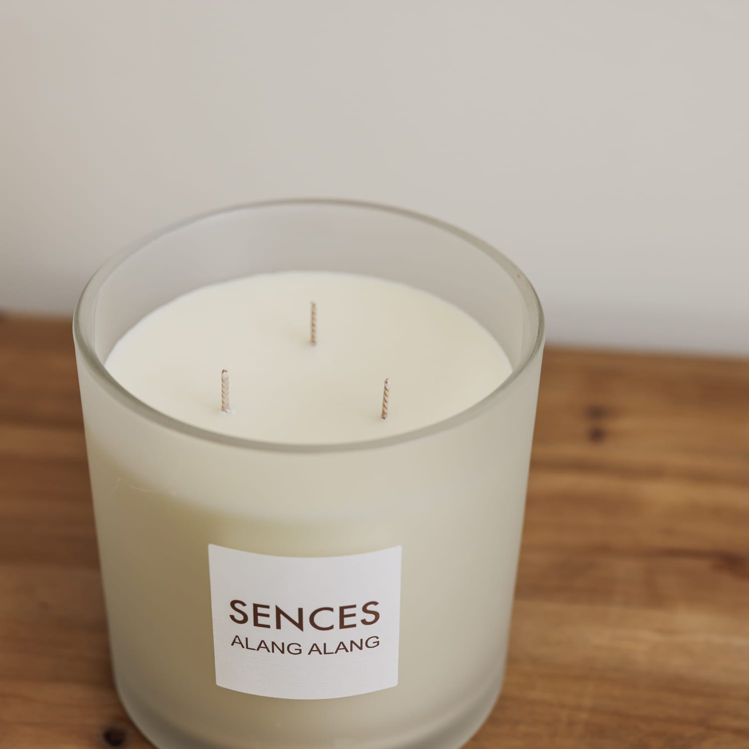 Sences Alang Alang White three wick candle in frosted glass view from above of wicks.