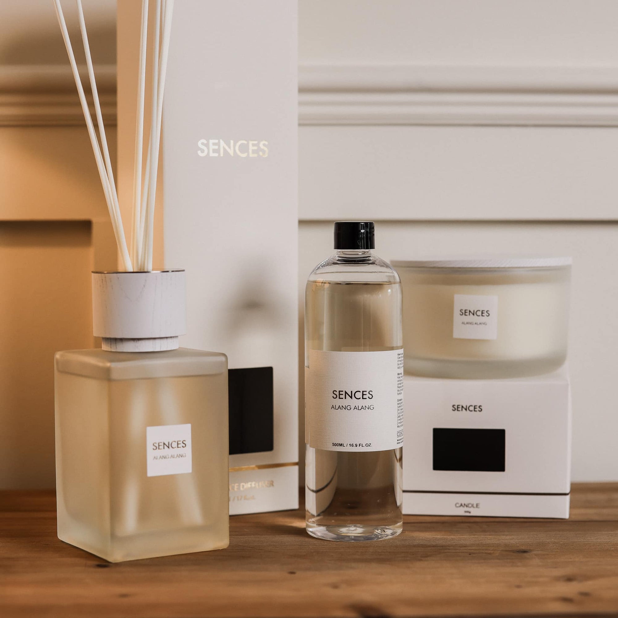 Sences Alang Alang White collection on wooden console, including diffuser, candle and refill scent.