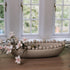 Cream oval bobble bowl with magnolia flowers.