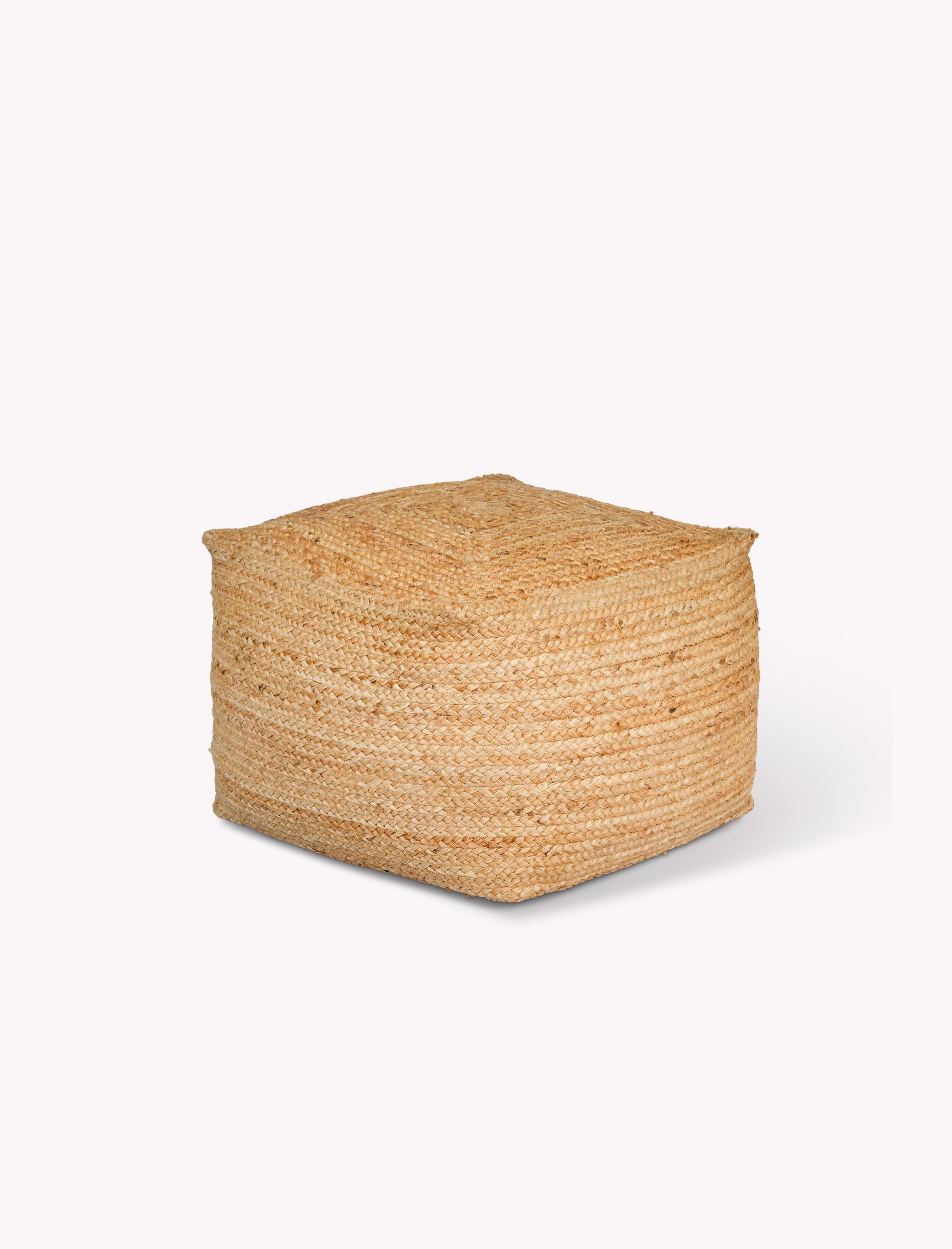 Woven cube-shaped jute pouf on a white background
