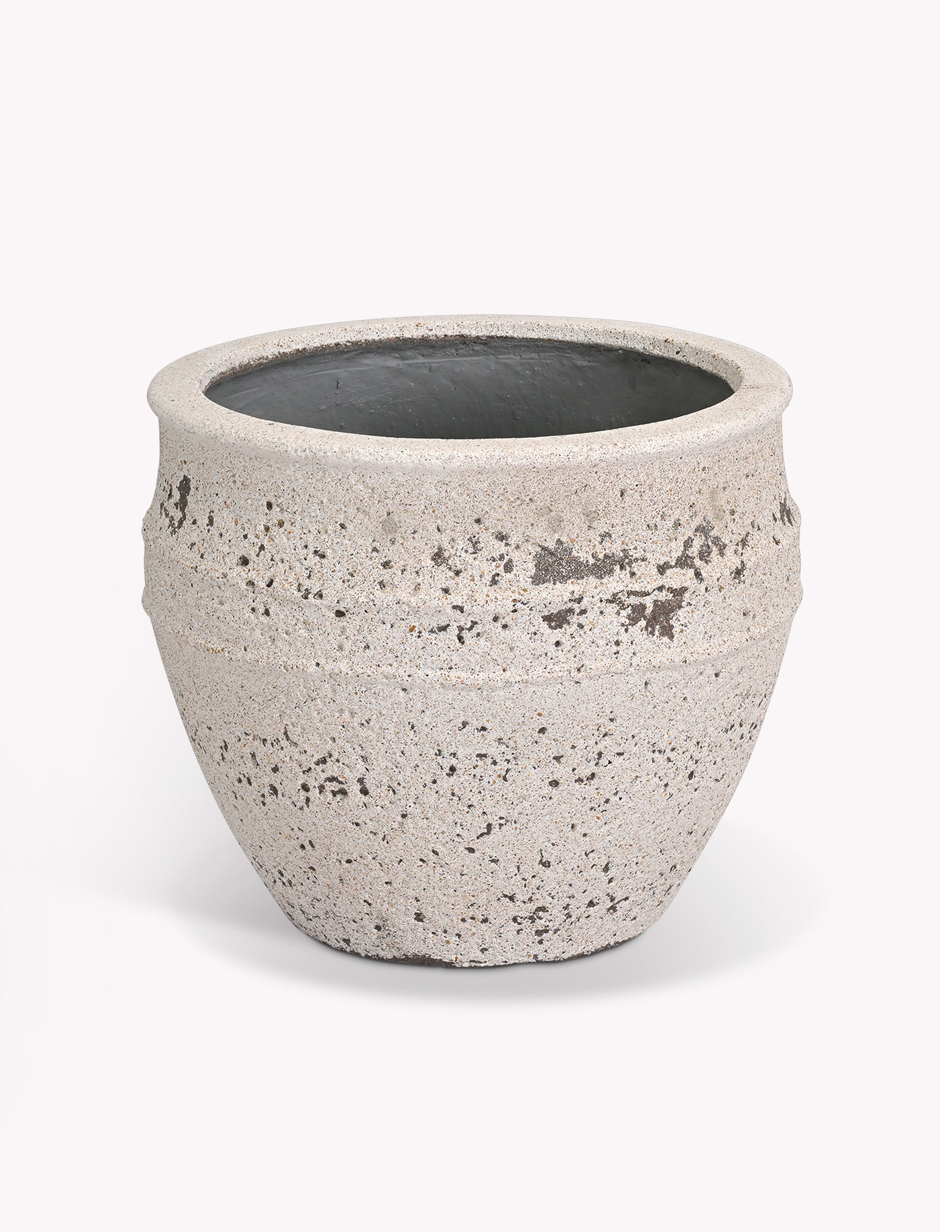 Large outdoor planter with a textured surface on a white background