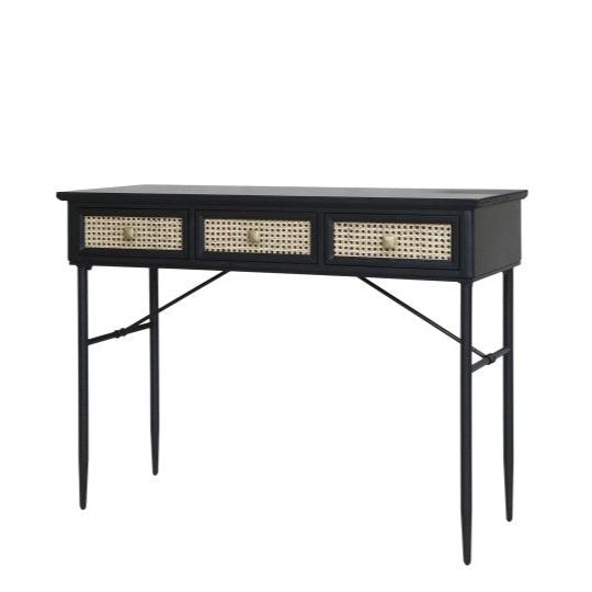 Black and rattan wooden desk with drawers.
