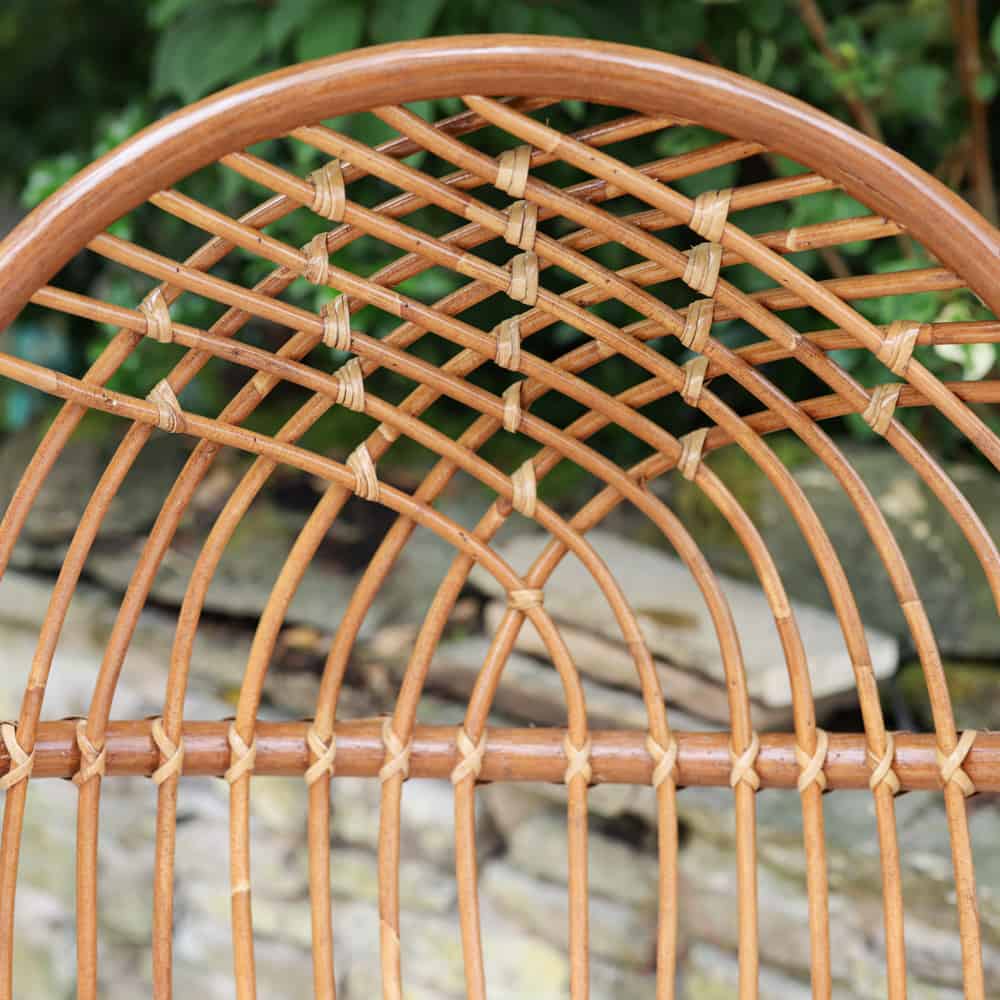 Close up of woven detail on rattan egg chair.