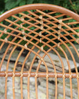 Close up of woven detail on rattan egg chair.