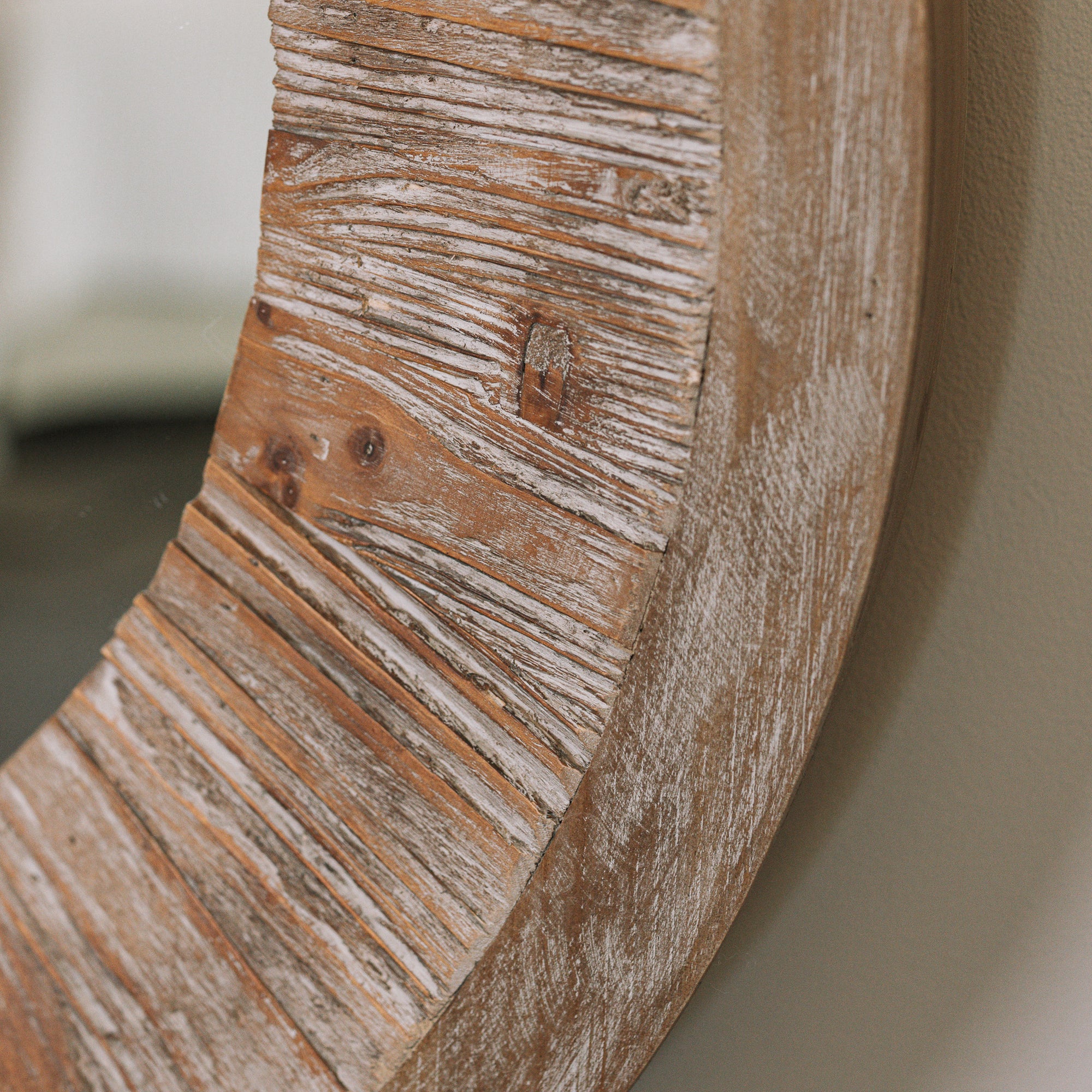 Detailed shot of the frame of a Rustic Round Wooden Mirror.