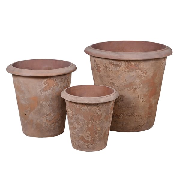 three rustic terracotta plant pots