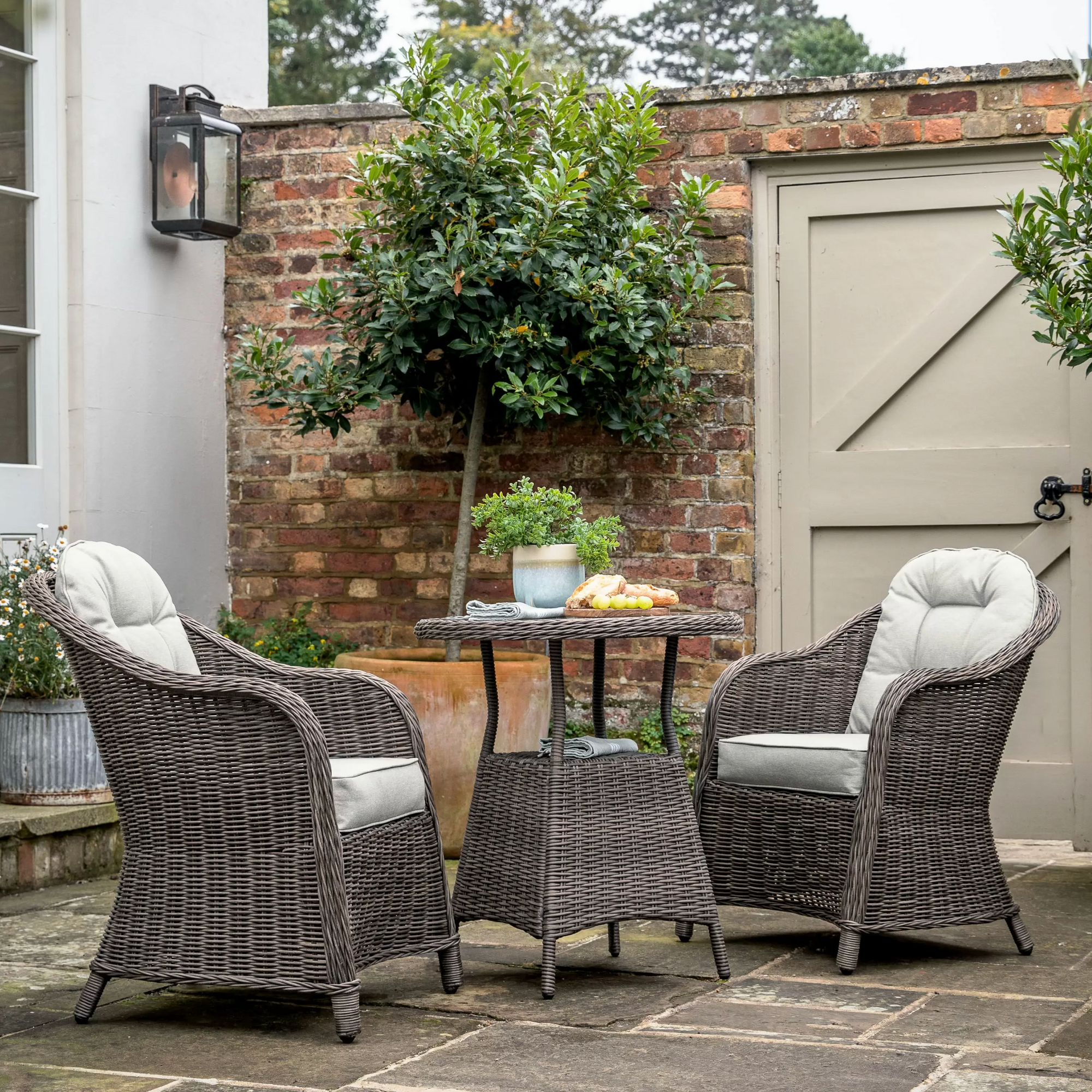 Rattan Bistro Set For Two in courtyard.
