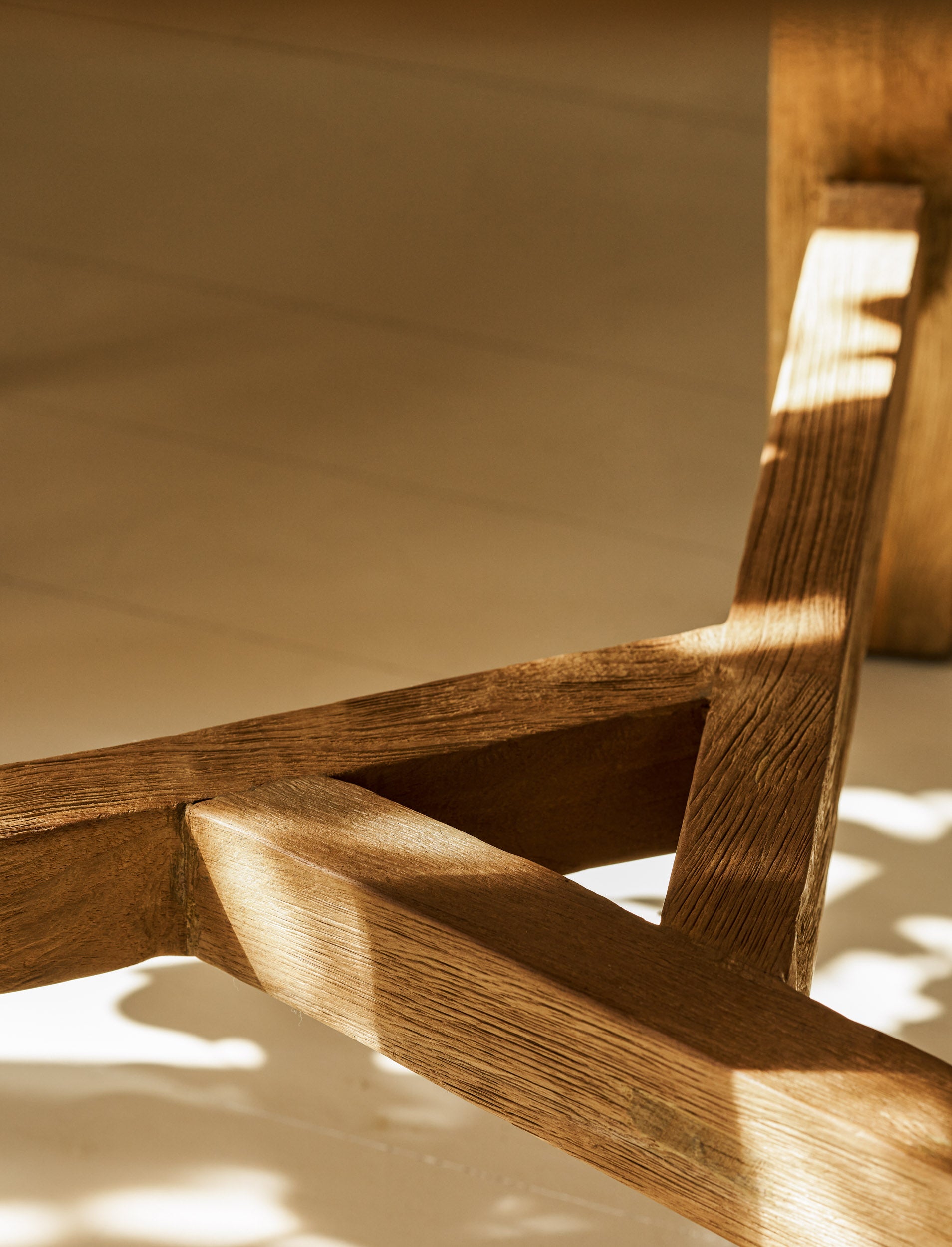 Close up of base on round wooden dining table