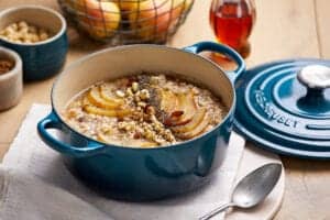 Le Creuset cast iron dish and baked porridge with maple syrup