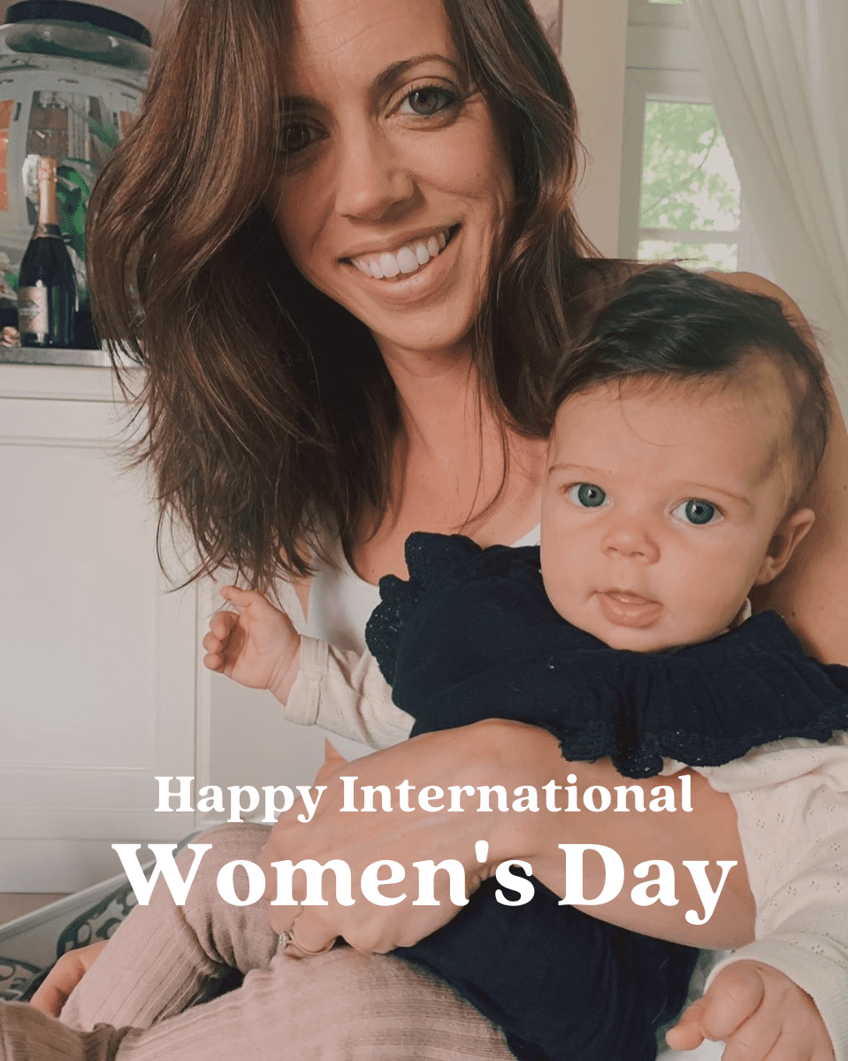 CEO Rebecca holding her daughter charlotte for International Womens day.